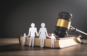 Paper cut family, judge gavel and book. Family Law - obrazy, fototapety, plakaty