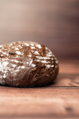 rye round bread on a wooden table