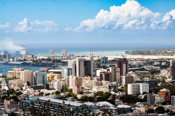 Port Louis city in Mauritius view from Signal Hill mountain on a beautiful sunny day with clouds and blue sky - obrazy, fototapety, plakaty