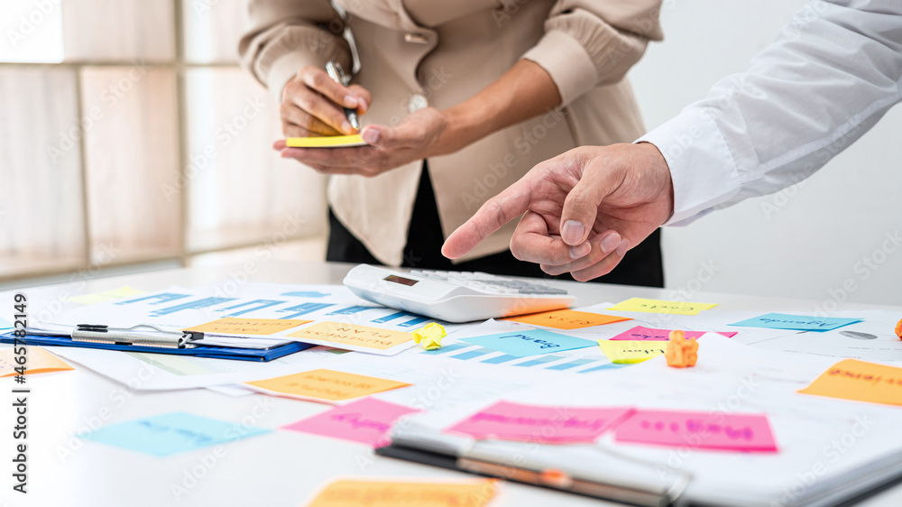 Poster business people team, boss holding book and pointing data on the table to explaining about new busin