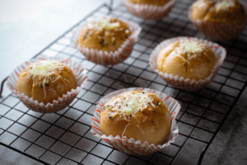 Garlic Cheese Bread (Yugjjog Maneulppang) is Korean Popular Street Food served on the table