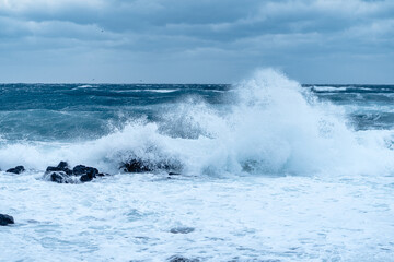 wave breaking on the beach
