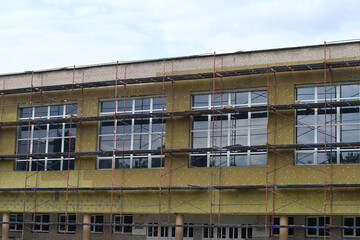 Insulating facade of the public building. Improving energy efficiency. 