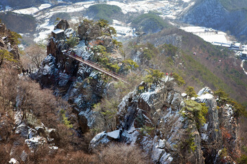 A rock covered with snow.