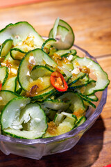 A bowl of appetizing cold dishes, pickled pickled cucumber slices