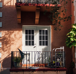 balcony with flowers and windows Miami Florida traditional Hause home 