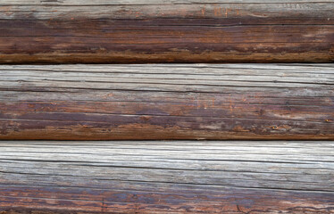 Background from old wooden boards with an interesting texture. Textured wood pattern. Photos of boards fitted to each other.