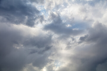Naklejka na ściany i meble Clouds on the sky as a background.