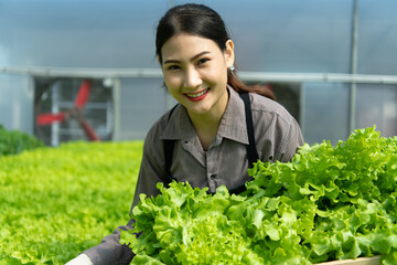 A new generation of asian young woman with organic vegetable business