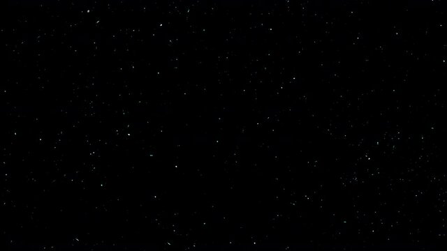 4k time lapse loop animation of the starry sky with falling meteors.