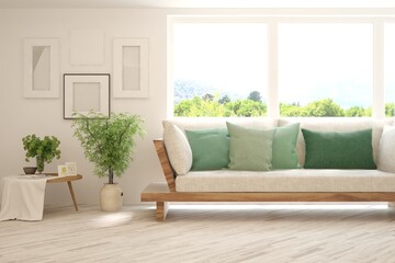 White living room with sofa and summer landscape in window. Scandinavian interior design. 3D illustration
