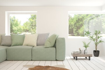 Stylish room in white color with sofa and summer landscape in window. Scandinavian interior design. 3D illustration