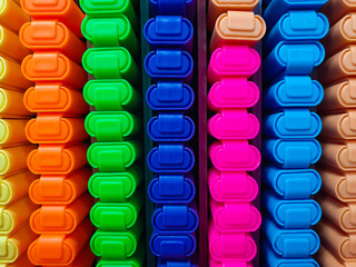 Colored markers arranged at the market