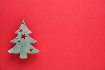 Fototapeta na wymiar christmas pine ornament on red background