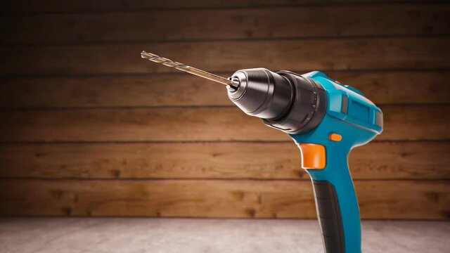 Working cordless drill on black background. Drill beet spinning in slow-motion.