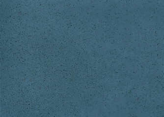 close up grainy light blue artificial stone texture background with blank space for design. cement with stones pigment as a background. abstract blue sandstone background.