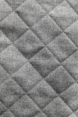 Gray quilted fabric pattern, vertical background photo