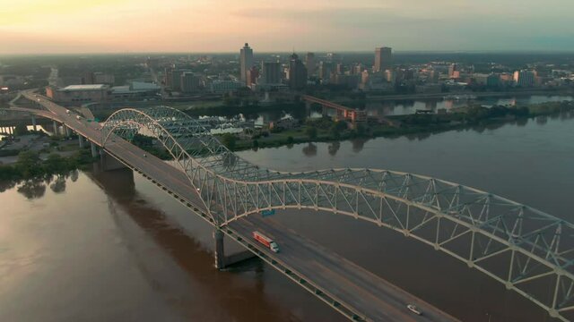 Aerial: Memphis Hernando De Soto Bridge and downtown Memphis at sunset, Tennessee. USA