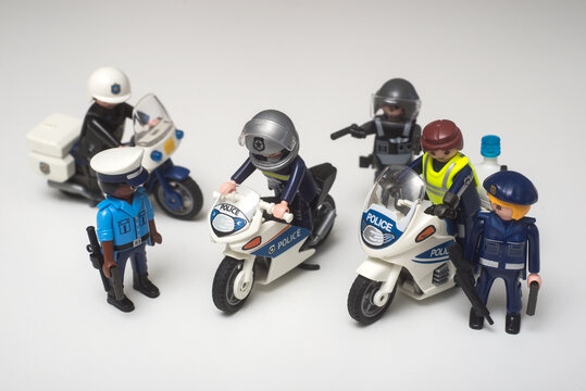 Mulhouse - France - 26 October 2021 - Closeup of policeman and motorbike Playmobil figurines collection on white background