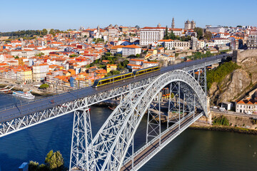 Porto Portugal with bridge Ponte Dom Luis I Douro river with tram town travel - obrazy, fototapety, plakaty