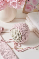 Knitted kids clothes and accessories for knitting. Needlework and knitting. Hobbies and creativity. Knit for children. Handmade