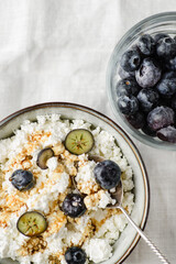 cottage cheese with blueberries on table
