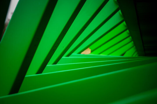 Abstract triangular green spiral in the park