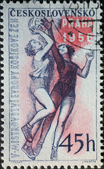 Czechoslovakia Circa 1956 : A postage stamp printed in Czechoslovakia showing Sports 1956. Two women playing basketball. Prague
