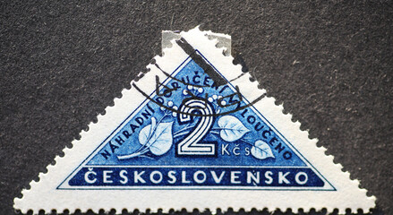 Czechoslovakia Circa 1953: A postage stamp printed in Czechoslovakia showing a postal stamp for personal delivery with the number 2 and leaves - obrazy, fototapety, plakaty