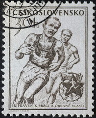 Czechoslovakia Circa 1954: A postage stamp printed in Czechoslovakia showing a portrait of the runner Emil Zátopek (1922-2000) during a competition