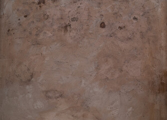 Fragment of old concrete brown wall