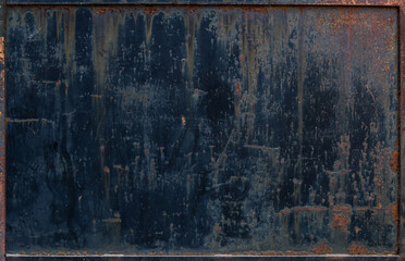 Fragment of old rusty metal surface. Textured background.