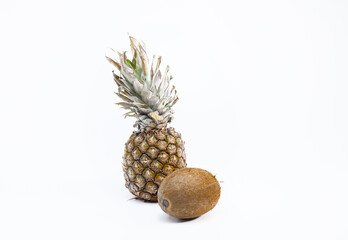Ripe pineapple and coconut on a white background healthy life concept	