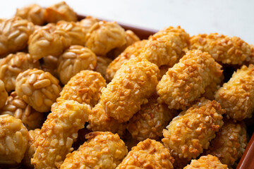 Panellets, traditional sweet dessert from Barcelona and Valencia made with potato, eggs, sugar and different nuts like almonds or  pinions. 