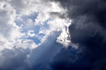 Obraz premium Blue and white cumulus storm clouds thunderstorm landscape