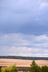 Blue and white cumulus storm clouds thunderstorm landscape