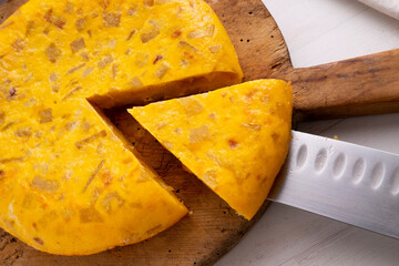 Tortilla Española. Traditional Spanish omelette made with fried potato, onion and egg.