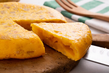 Tortilla Española. Traditional Spanish omelette made with fried potato, onion and egg.