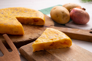 Tortilla Española. Traditional Spanish omelette made with fried potato, onion and egg.