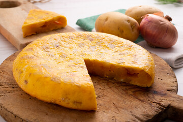 Tortilla Española. Traditional Spanish omelette made with fried potato, onion and egg.