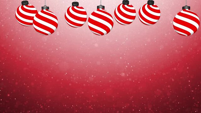 Red christmas baubles swinging on the string on glittering copy space greeting card animation background.
