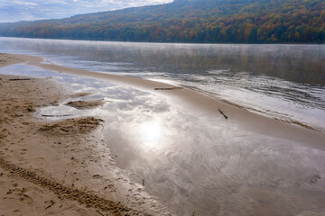 Morning fog over the river in autumn