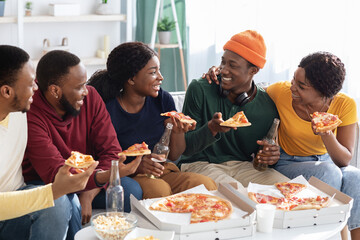 Group of african american millennials throwing home party