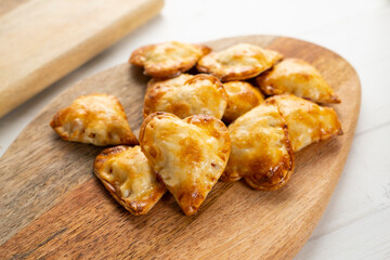 Argentinian heart-shaped dumplings stuffed with beef.
