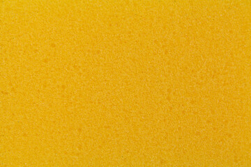 texture of yellow dishwashing sponge, close-up