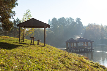 gazebo on the shore on an autumn day in the morning sun