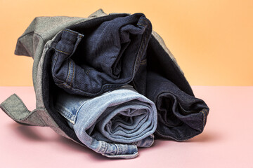 Blue jeans on colorful background isolated