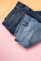 Blue jeans on colorful background isolated