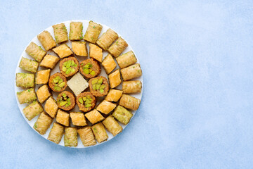 Traditional turkish, arabic dessert baklava assortment with pistachio. Ramadan sweets. Top view,...