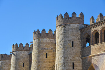 Zaragoza, Spain - 23 Oct, 2021: Exterior walls of the Palacio de la Aljaferia, Zaragoza